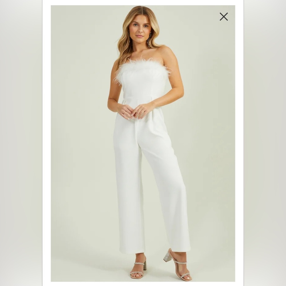 Brand new without tags super cute bridal/bachelorette ostrich feather jumpsuit.